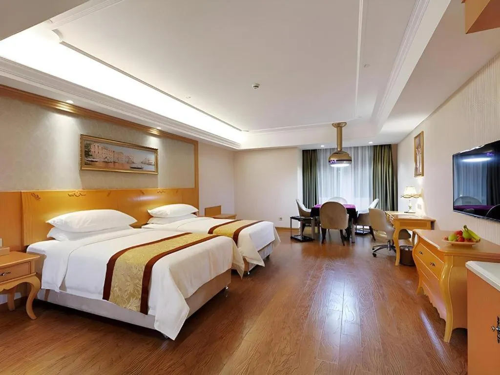 Bed in Vienna Hotel Chengdu Airport Shuangliu Wanda