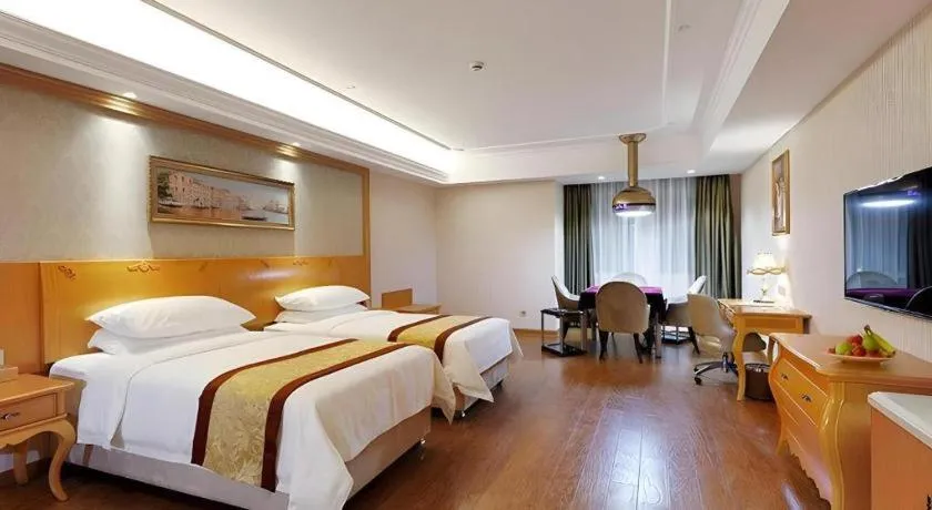 Bed in Vienna Hotel Chengdu Airport Shuangliu Wanda