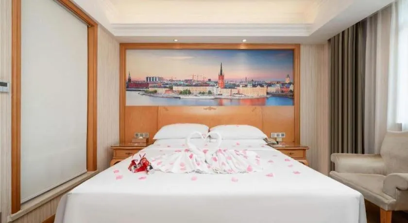 Bed in Vienna Hotel Chengdu Airport Shuangliu Wanda