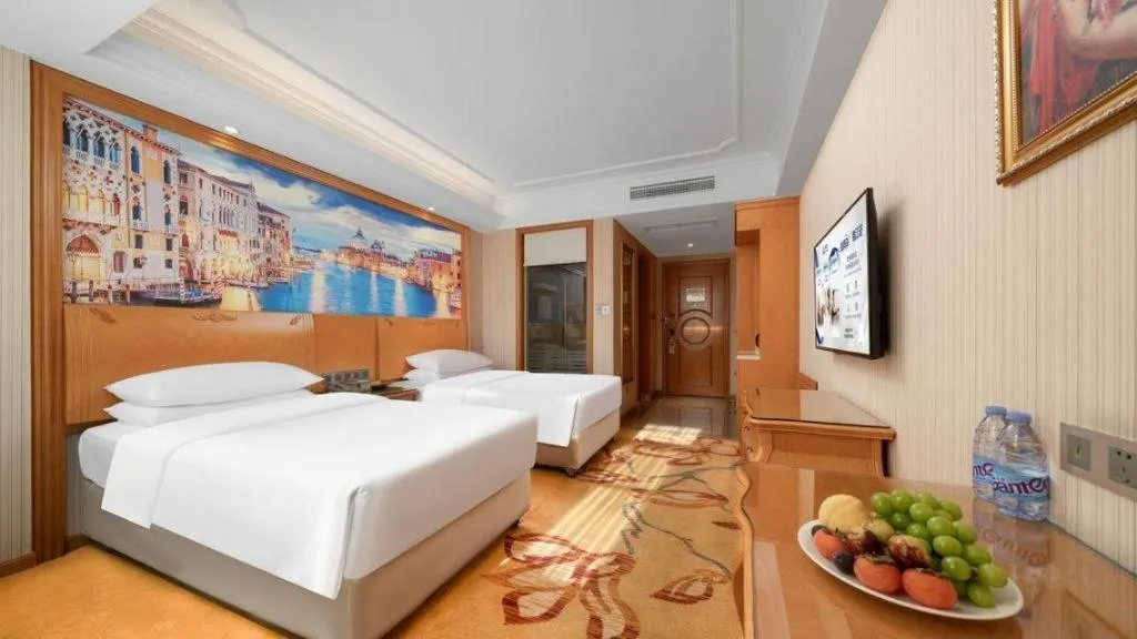 Bed in Vienna Hotel Chengdu Airport Shuangliu Wanda