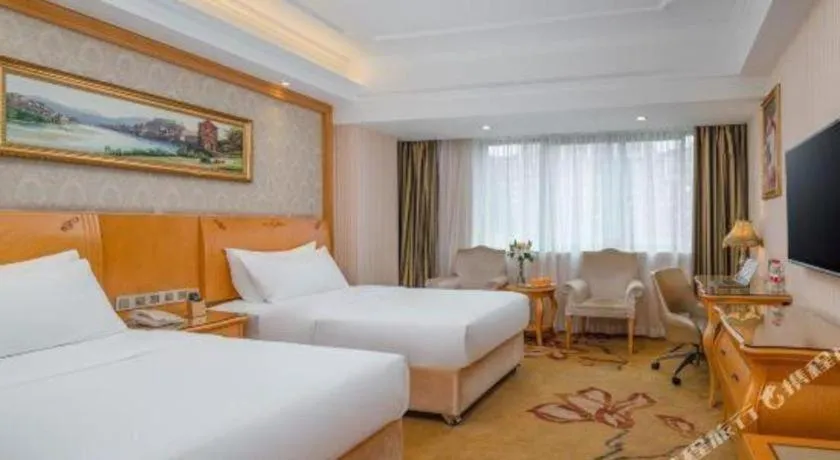 Bed in Vienna Hotel Chengdu Airport Shuangliu Wanda