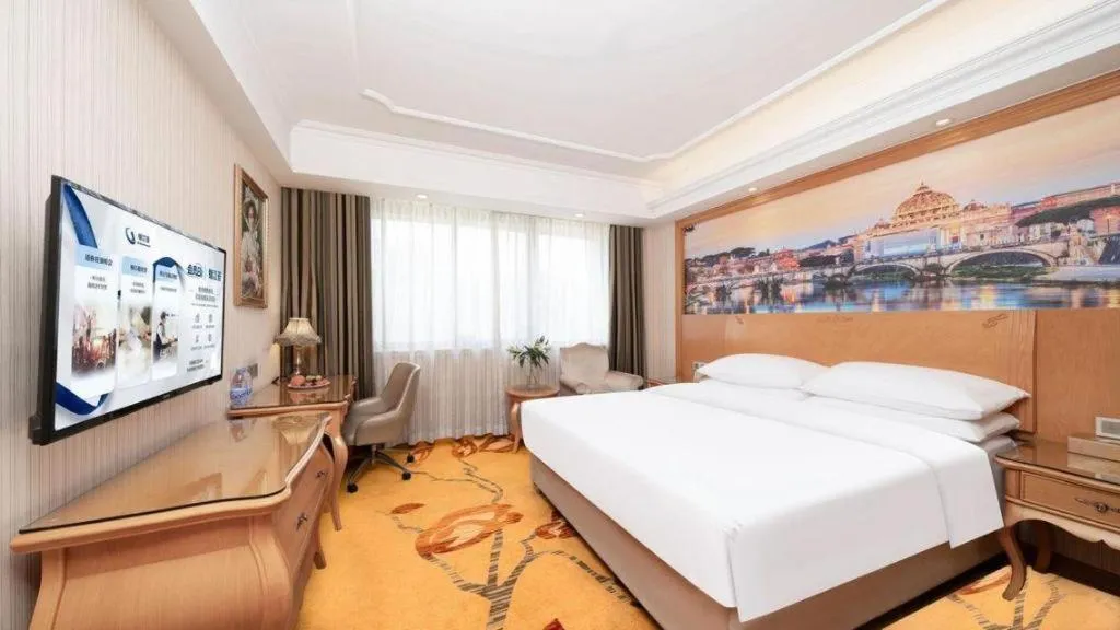 Bed in Vienna Hotel Chengdu Airport Shuangliu Wanda