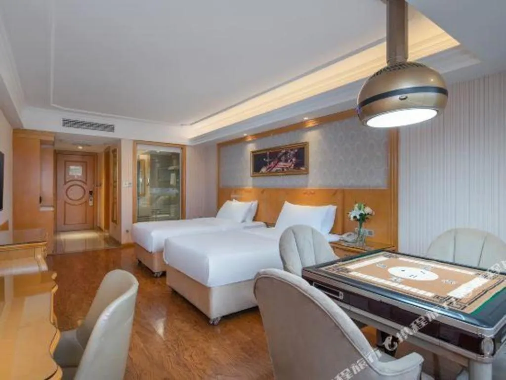 Bed in Vienna Hotel Chengdu Airport Shuangliu Wanda