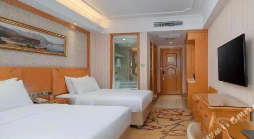 Bed in Vienna Hotel Chengdu Airport Shuangliu Wanda