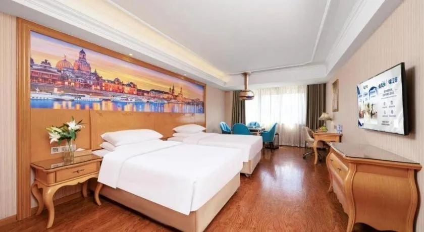 Bed in Vienna Hotel Chengdu Airport Shuangliu Wanda