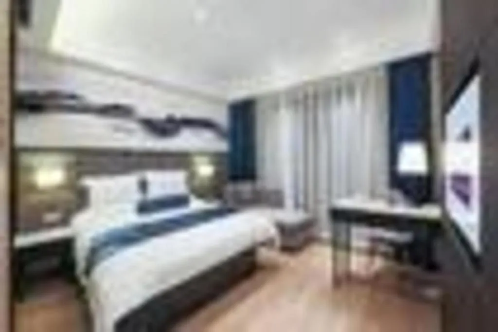 Bed in Yitel Shenyang Hunnan Olympic Sports Center Wanda Plaza