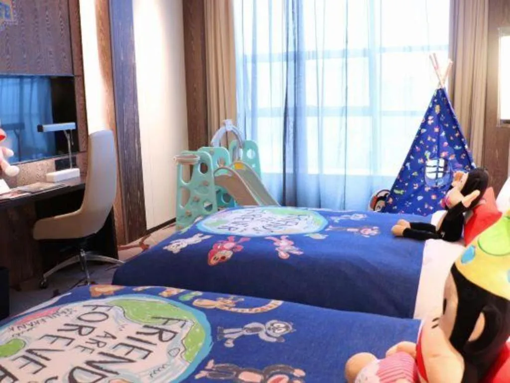 Bed in Swisstouches Hotel Ankang