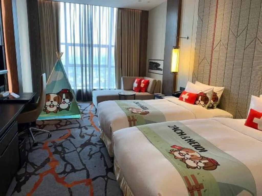 Bed in Swisstouches Hotel Ankang