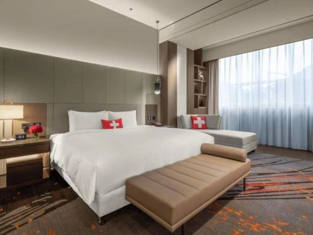 Bed in Swisstouches Hotel Ankang