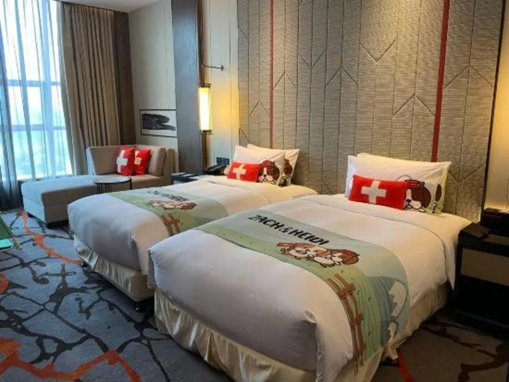 Bed in Swisstouches Hotel Ankang