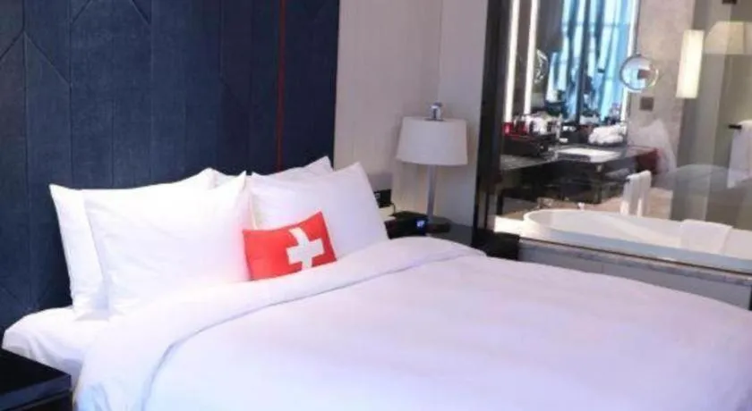 Bed in Swisstouches Hotel Ankang