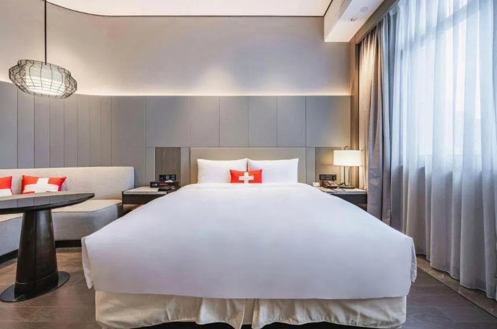 Bed in Swisstouches Hotel Ankang