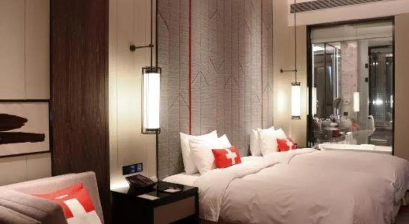 Bed in Swisstouches Hotel Ankang