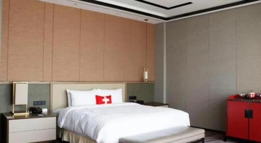 Bed in Swisstouches Hotel Ankang