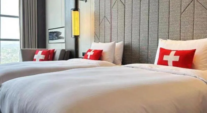 Bed in Swisstouches Hotel Ankang