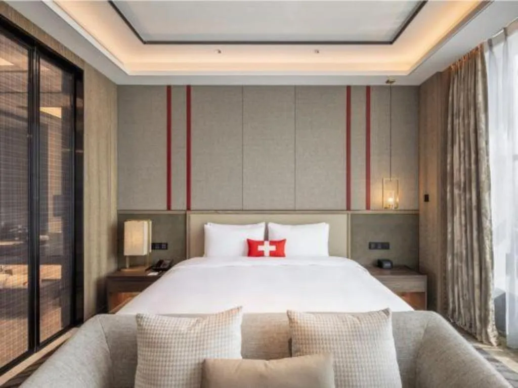 Bed in Swisstouches Hotel Ankang