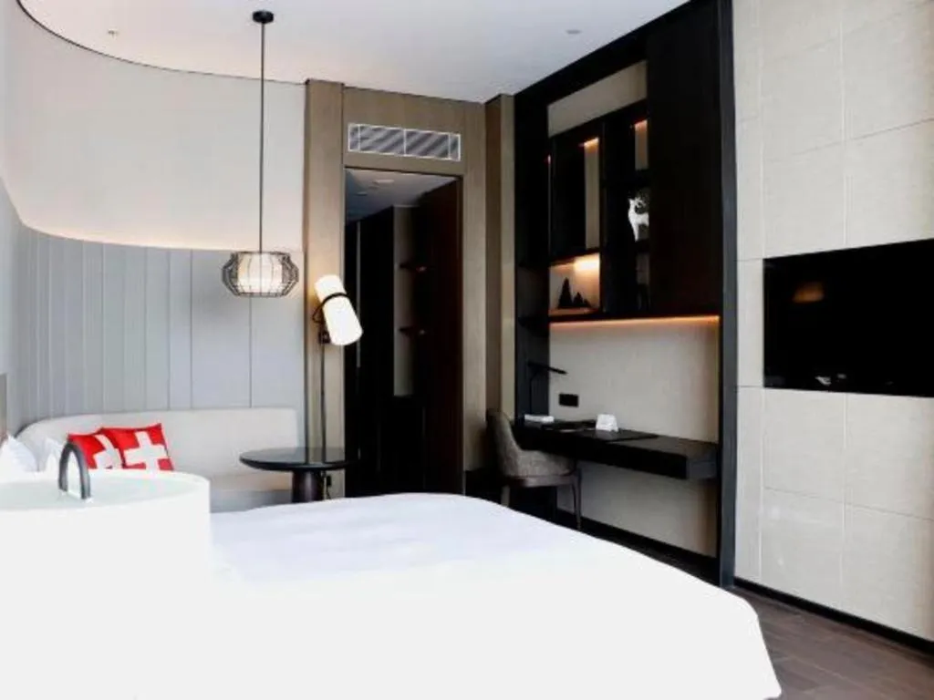 Bed in Swisstouches Hotel Ankang