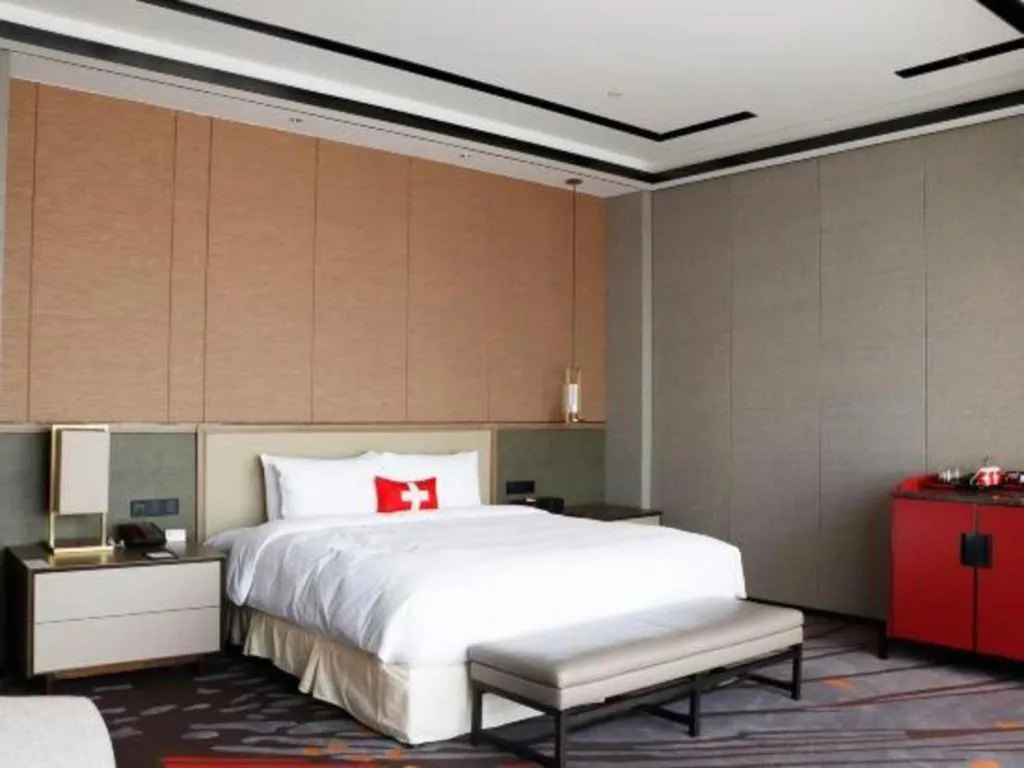 Bed in Swisstouches Hotel Ankang