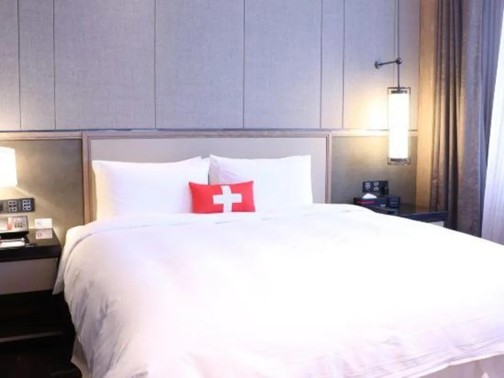 Bed in Swisstouches Hotel Ankang