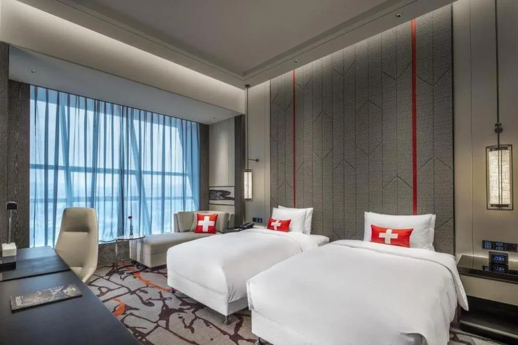 Bed in Swisstouches Hotel Ankang