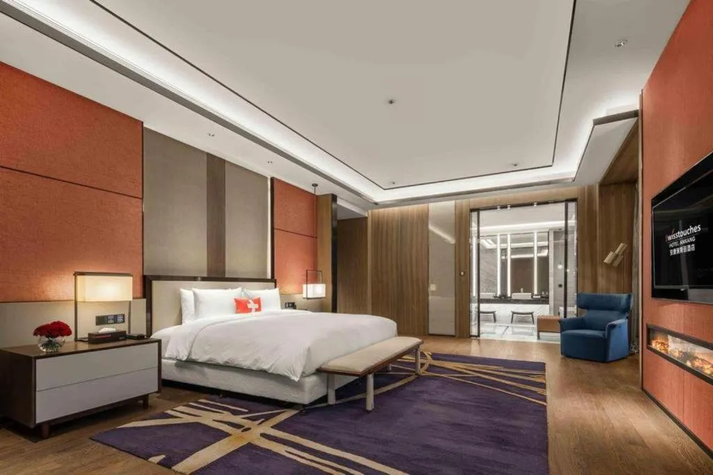 Bed in Swisstouches Hotel Ankang