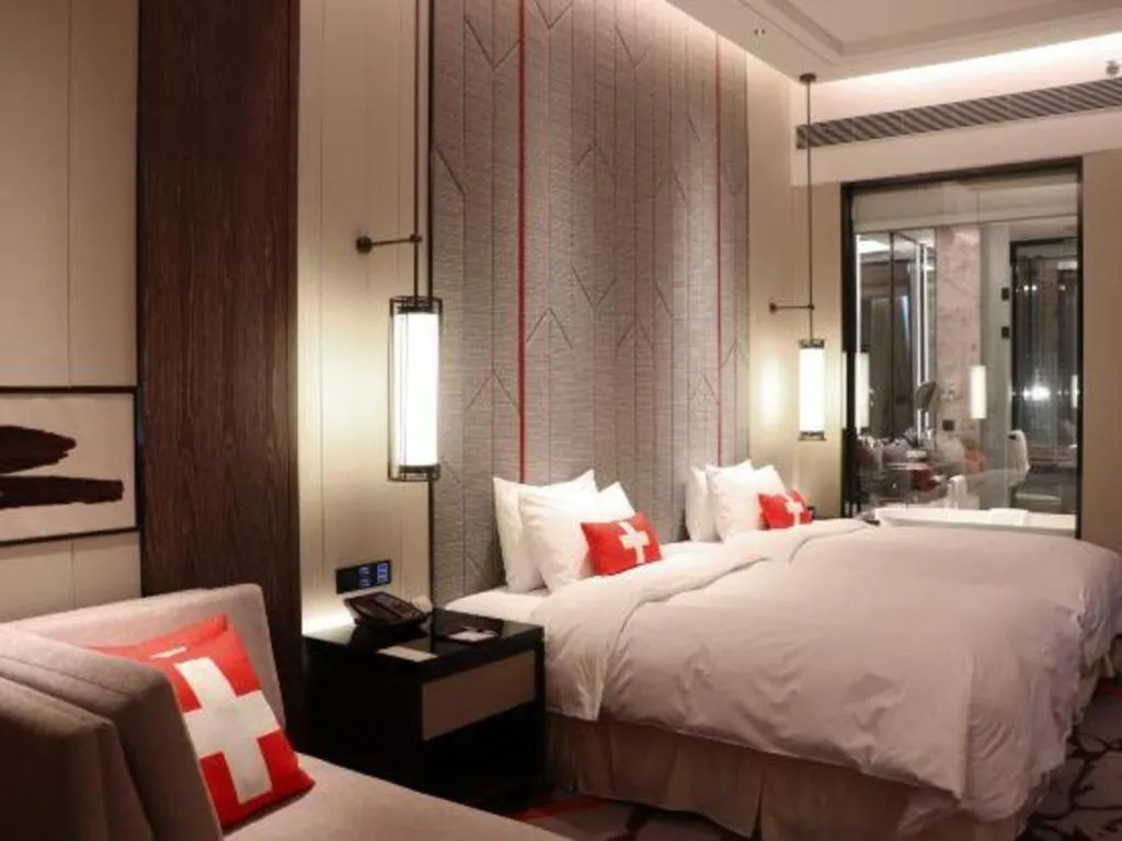 Bed in Swisstouches Hotel Ankang