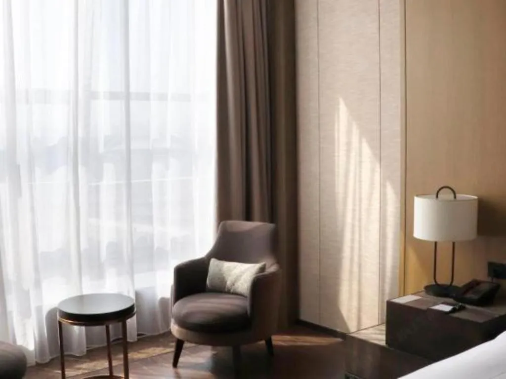 Bed in Swisstouches Hotel Ankang