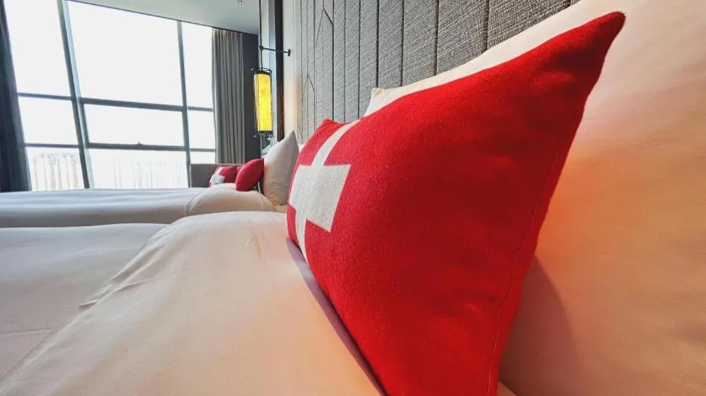 Bed in Swisstouches Hotel Ankang