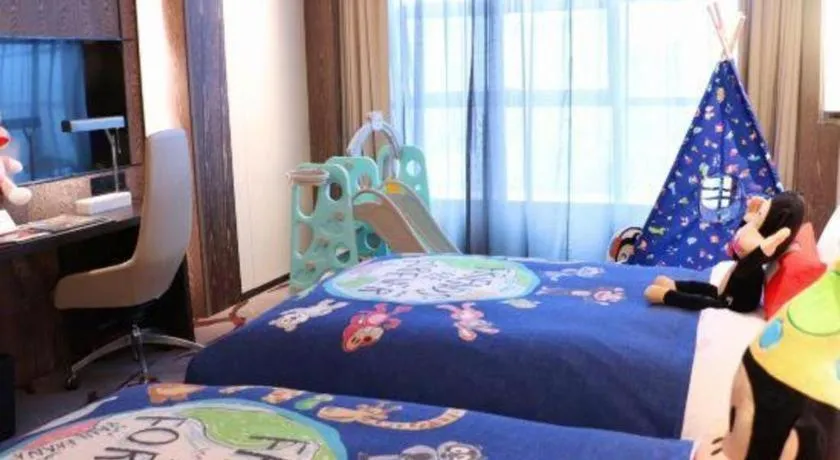 Bed in Swisstouches Hotel Ankang