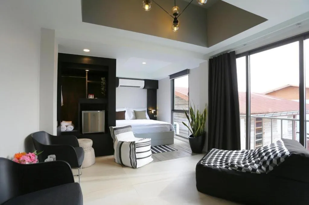 Bed in The River House Chiangkhan Hotel