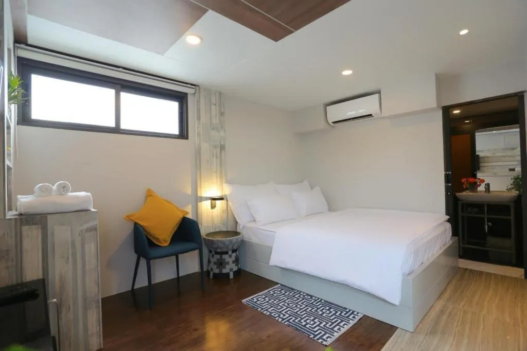 Bed in The River House Chiangkhan Hotel