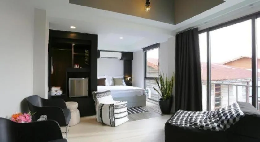 Bed in The River House Chiangkhan Hotel