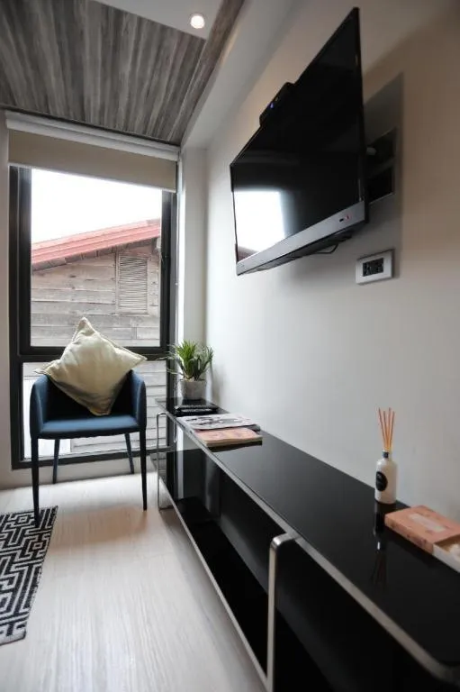 Bed in The River House Chiangkhan Hotel