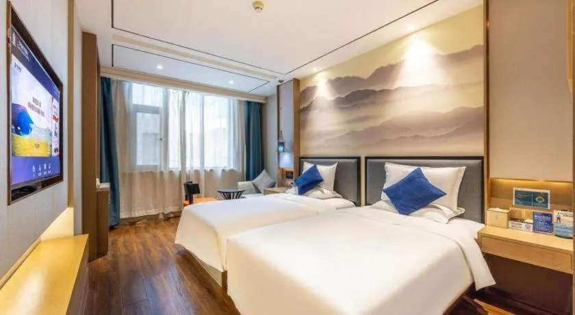 Bed in East Queen Hotel (Xi'an Beimen Metro Station)