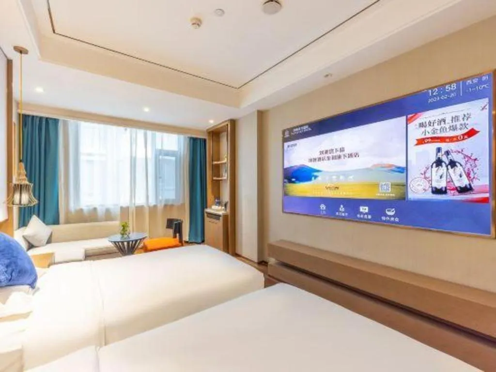 Bed in East Queen Hotel (Xi'an Beimen Metro Station)