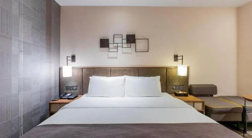 Bed in Home Inn Plus Shanghai Pudong Xinjinqiao Road