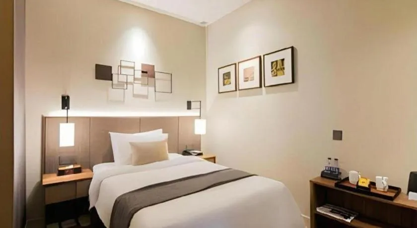 Bed in Home Inn Plus Shanghai Pudong Xinjinqiao Road