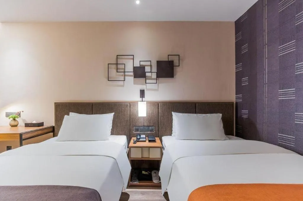 Bed in Home Inn Plus Shanghai Pudong Xinjinqiao Road