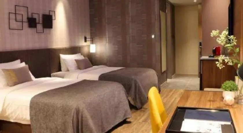 Bed in Home Inn Plus Shanghai Pudong Xinjinqiao Road