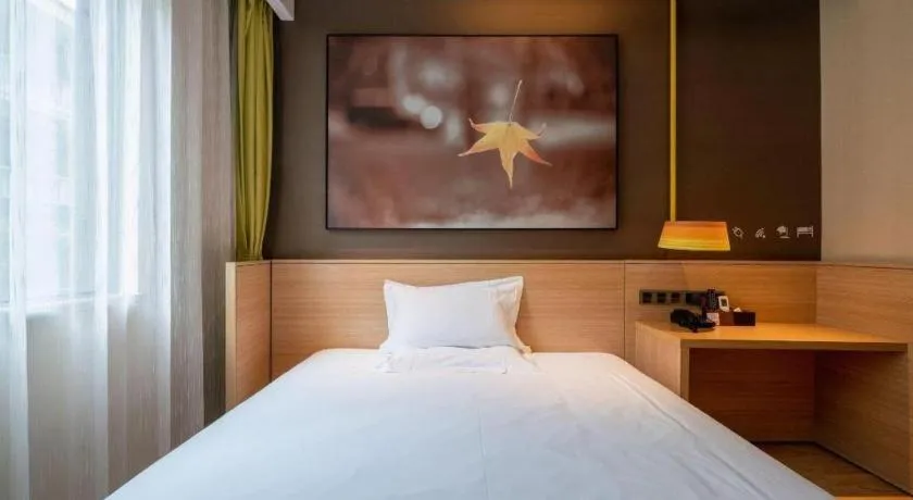 Bed in IU Hotel Kunming Jinma Bijifang Joy City