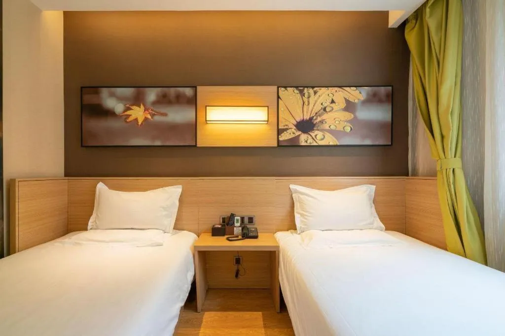 Bed in IU Hotel Kunming Jinma Bijifang Joy City