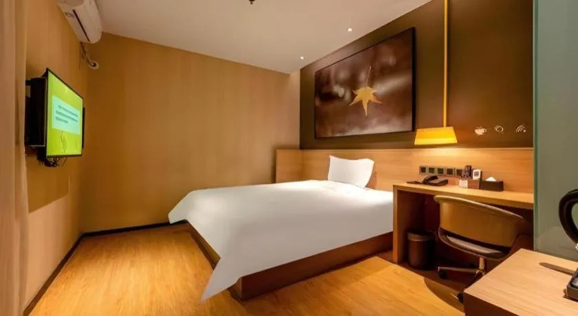 Bed in IU Hotel Kunming Jinma Bijifang Joy City