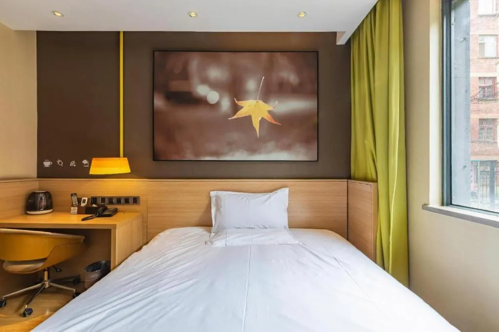 Bed in IU Hotel Kunming Jinma Bijifang Joy City