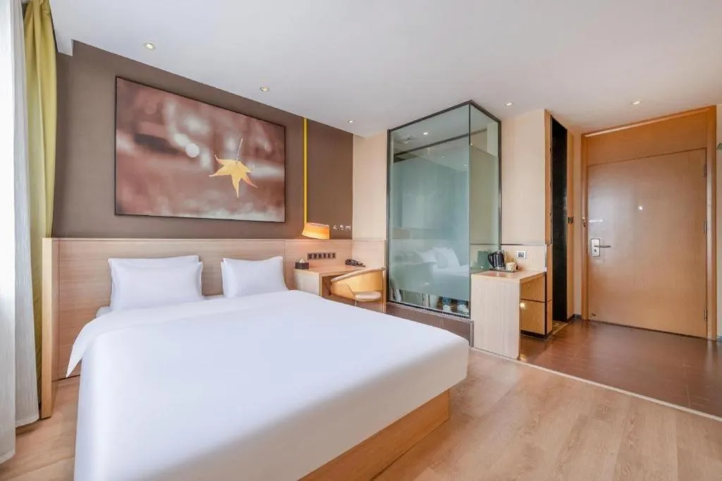 Bed in IU Hotel Kunming Jinma Bijifang Joy City