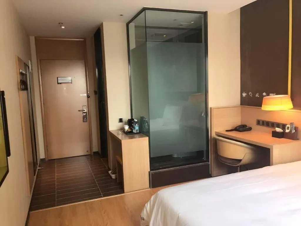 Bed in IU Hotel Kunming Jinma Bijifang Joy City