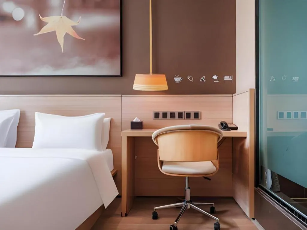 Bed in IU Hotel Kunming Jinma Bijifang Joy City