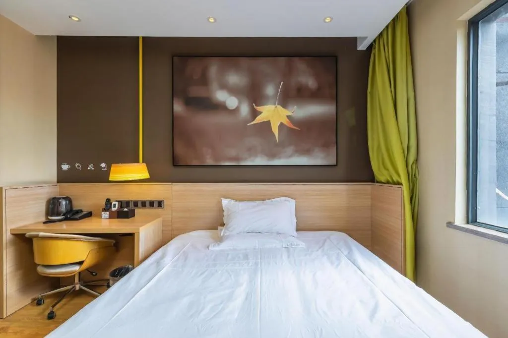 Bed in IU Hotel Kunming Jinma Bijifang Joy City