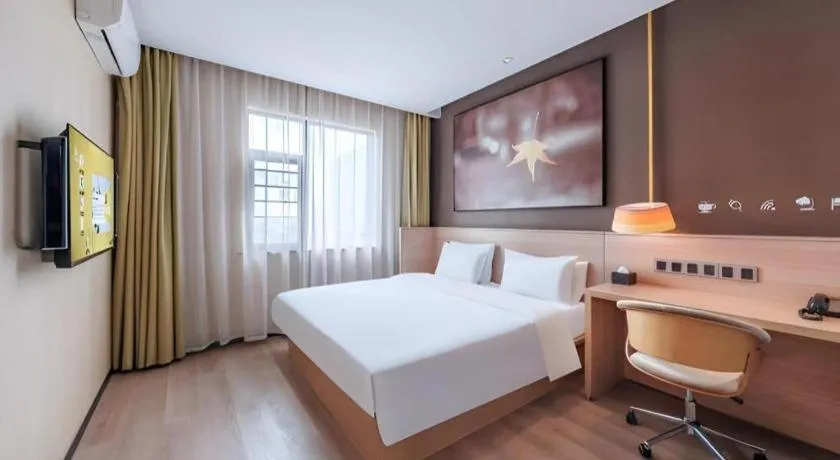 Bed in IU Hotel Kunming Jinma Bijifang Joy City