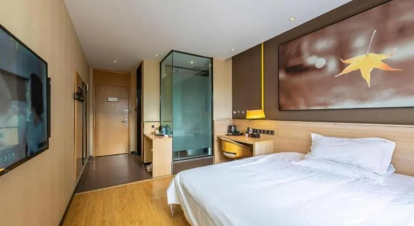 Bed in IU Hotel Kunming Jinma Bijifang Joy City