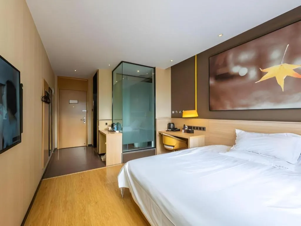 Bed in IU Hotel Kunming Jinma Bijifang Joy City